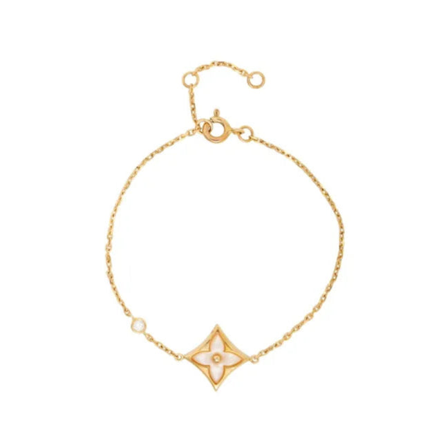 BLOMST ARMBÅND | GULD