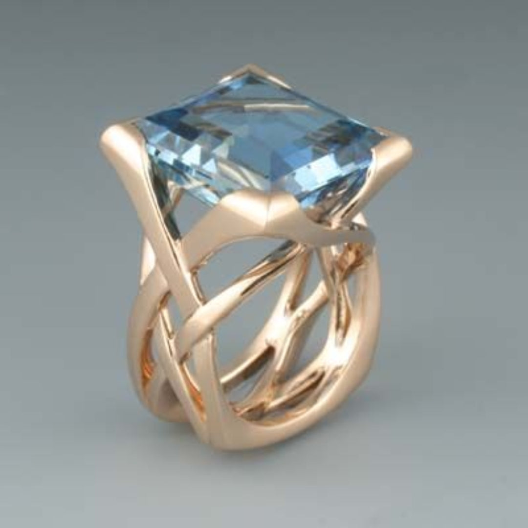 Vintage ring i rosaguld og blå zirkonium