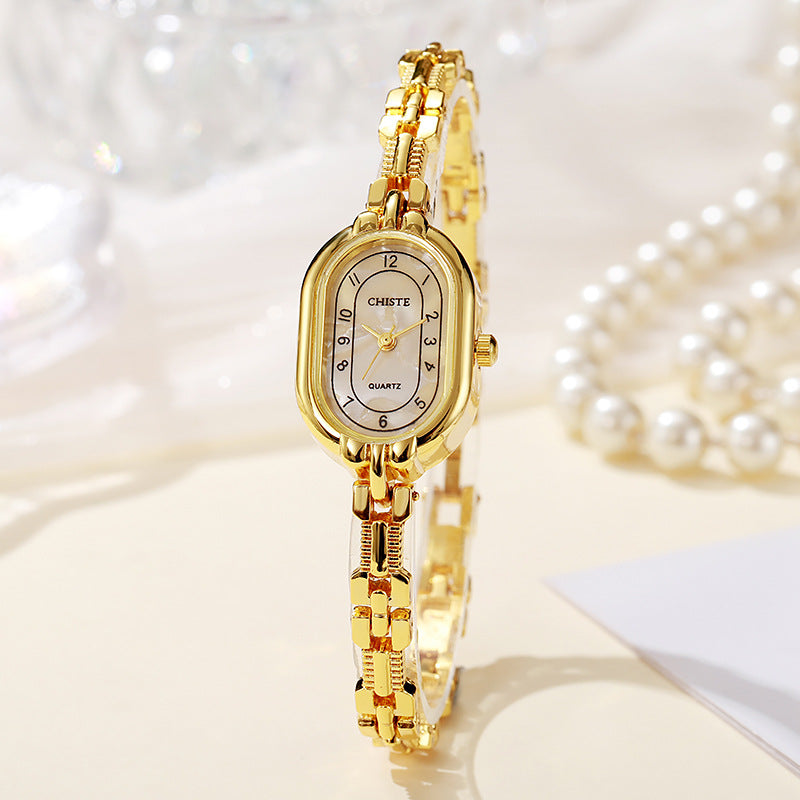 Alira Moment Ur | 18 karat guld