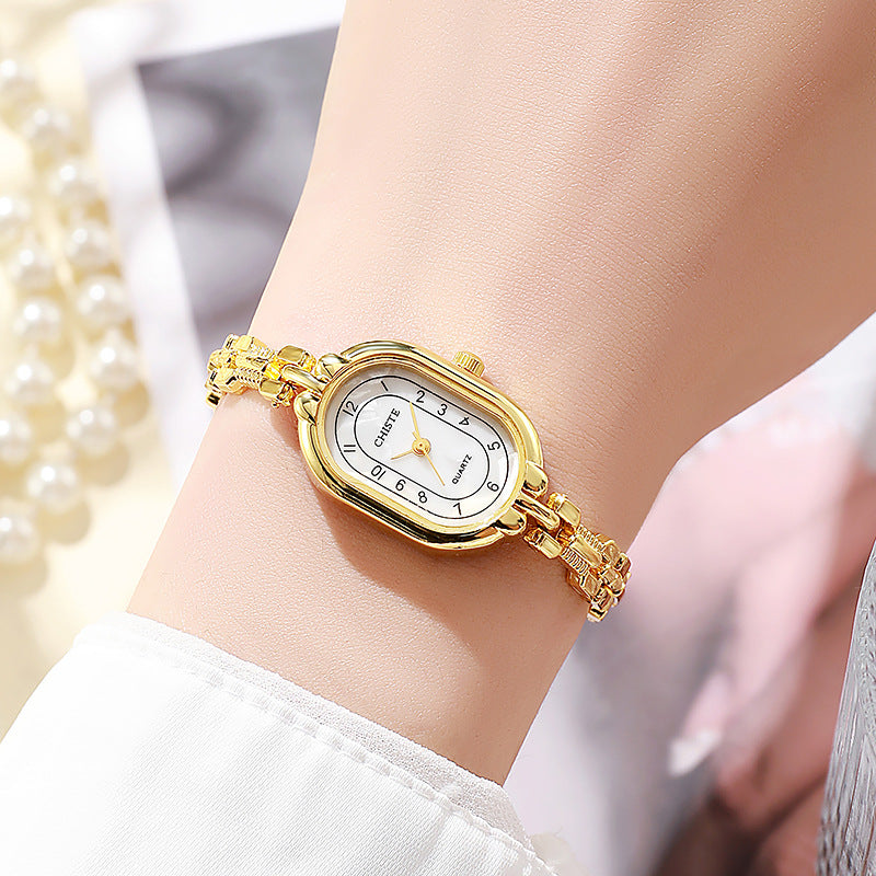 Alira Moment Ur | 18 karat guld