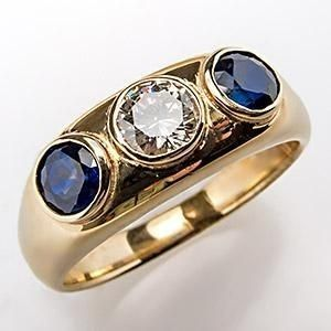 Vintage ring i guld med indlæg af blåt glas og zirkonium